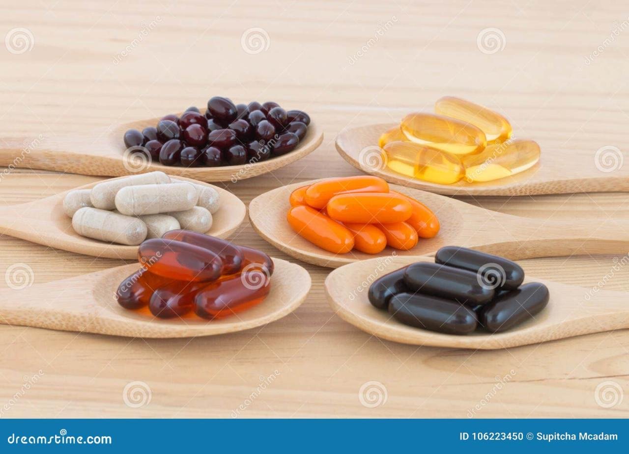 Healthy Vitamin Upplement Capsules in a Spoons. Stock Photo - Image of ...